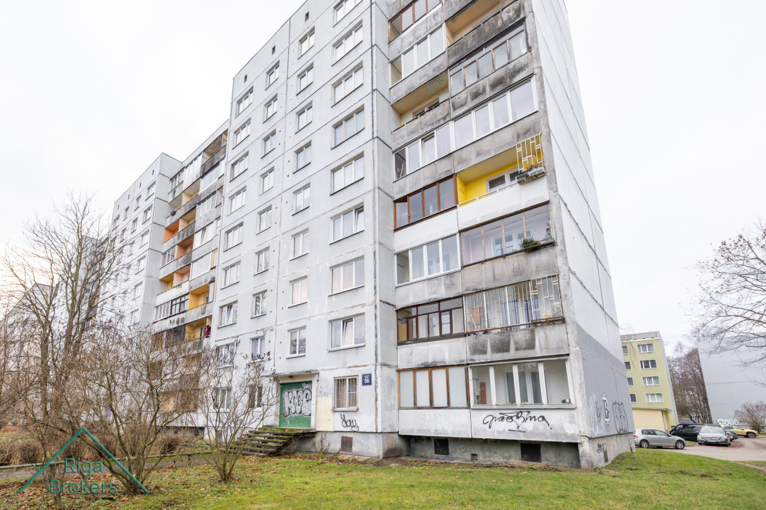  Exterior of apartment building with balconies.