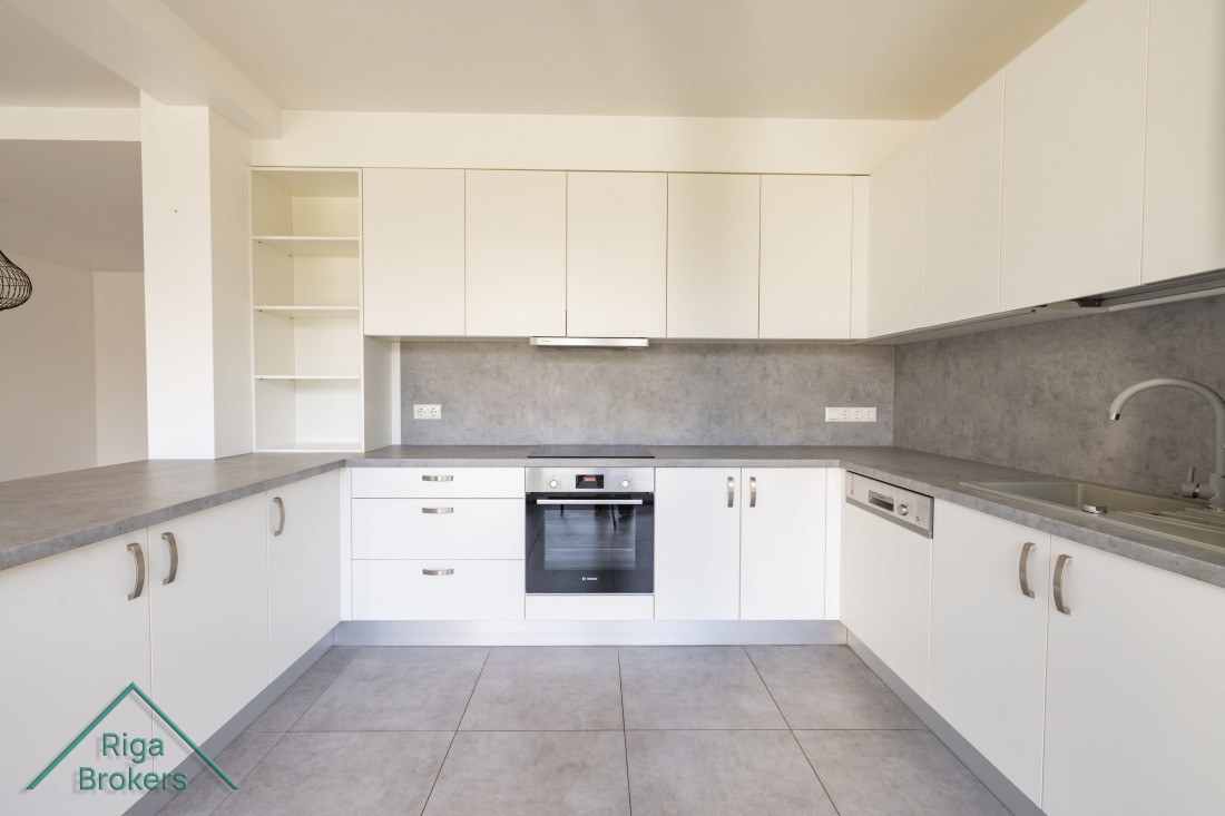 Bright kitchen with built-in appliances