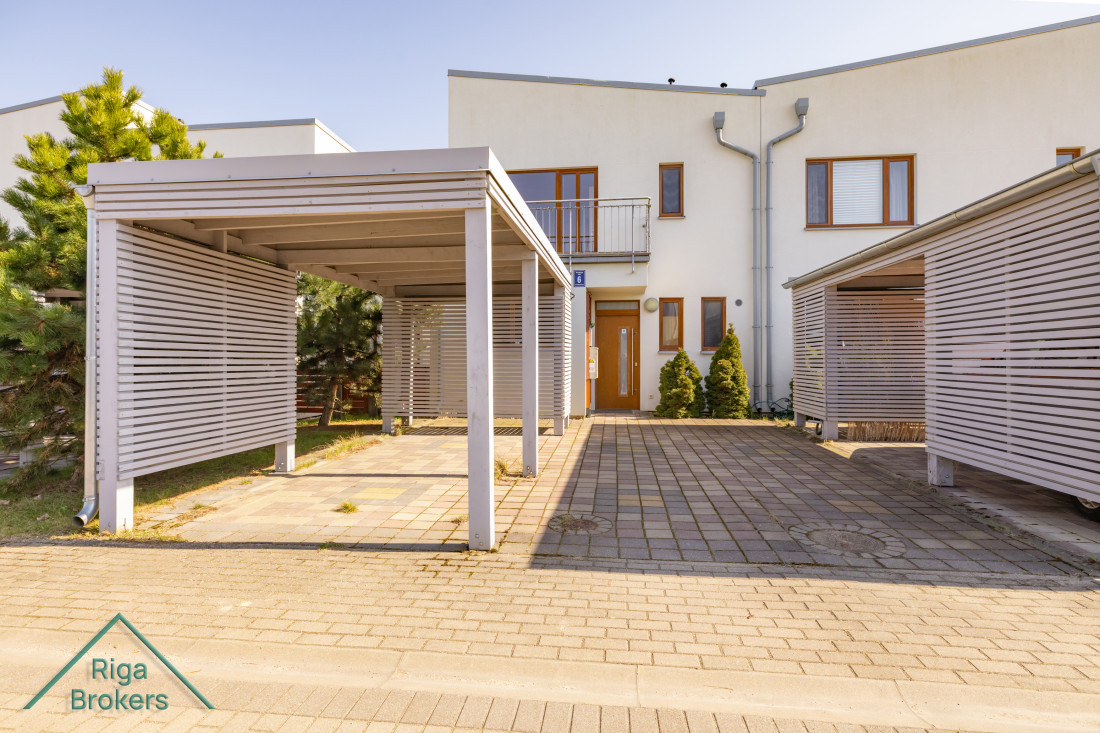Townhouse entrance with carport