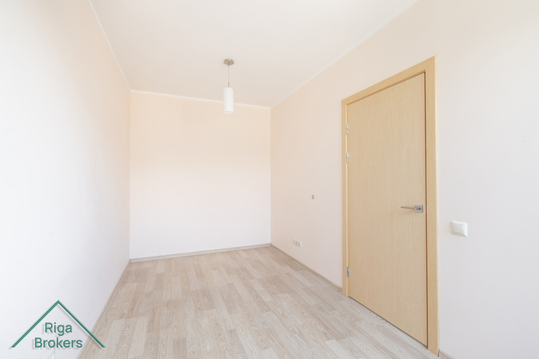 Narrow room with light finish