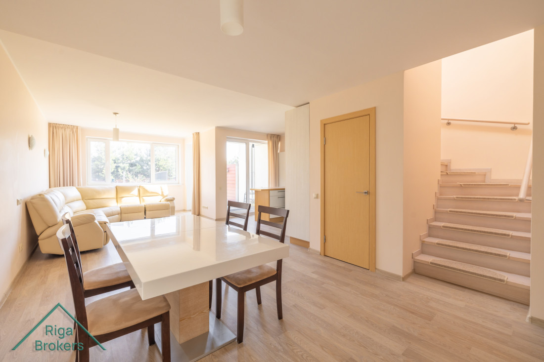 Dining area and stairs to second floor