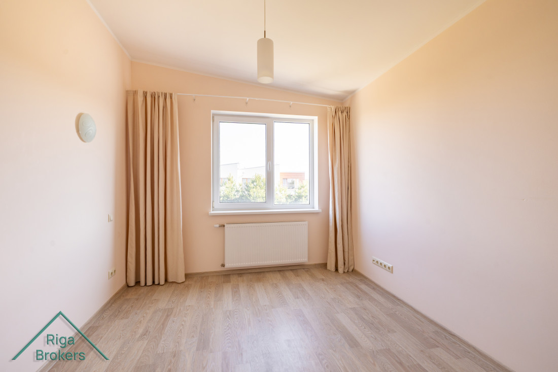 Room with a window facing courtyard