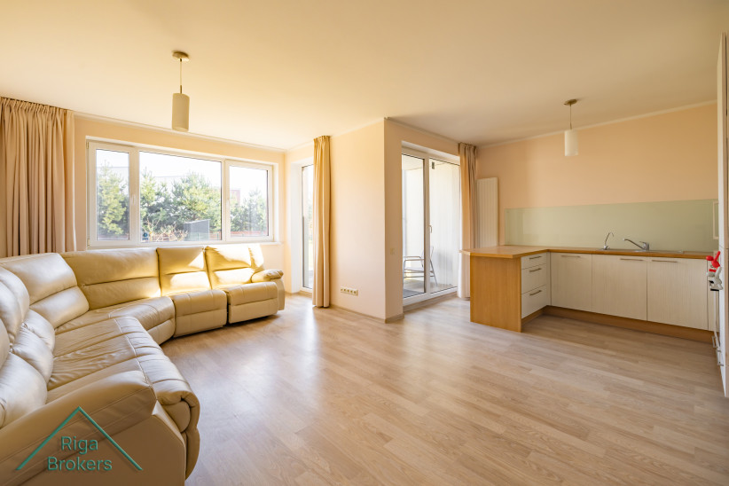 Living room with open-plan kitchen