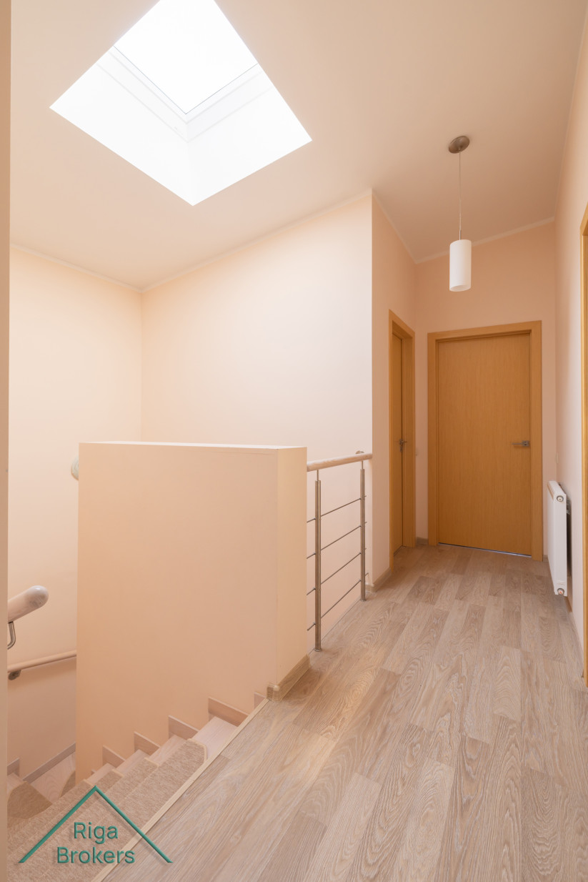 Stair landing with skylight