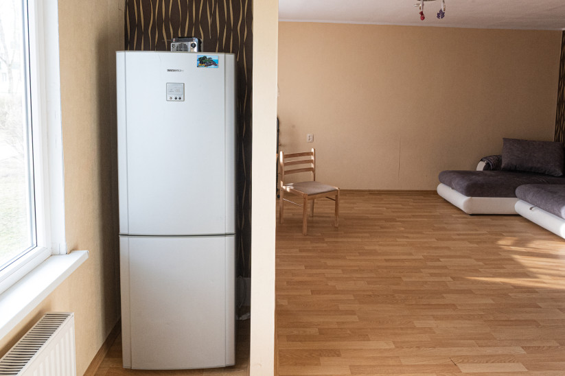 Refrigerator and part of living room