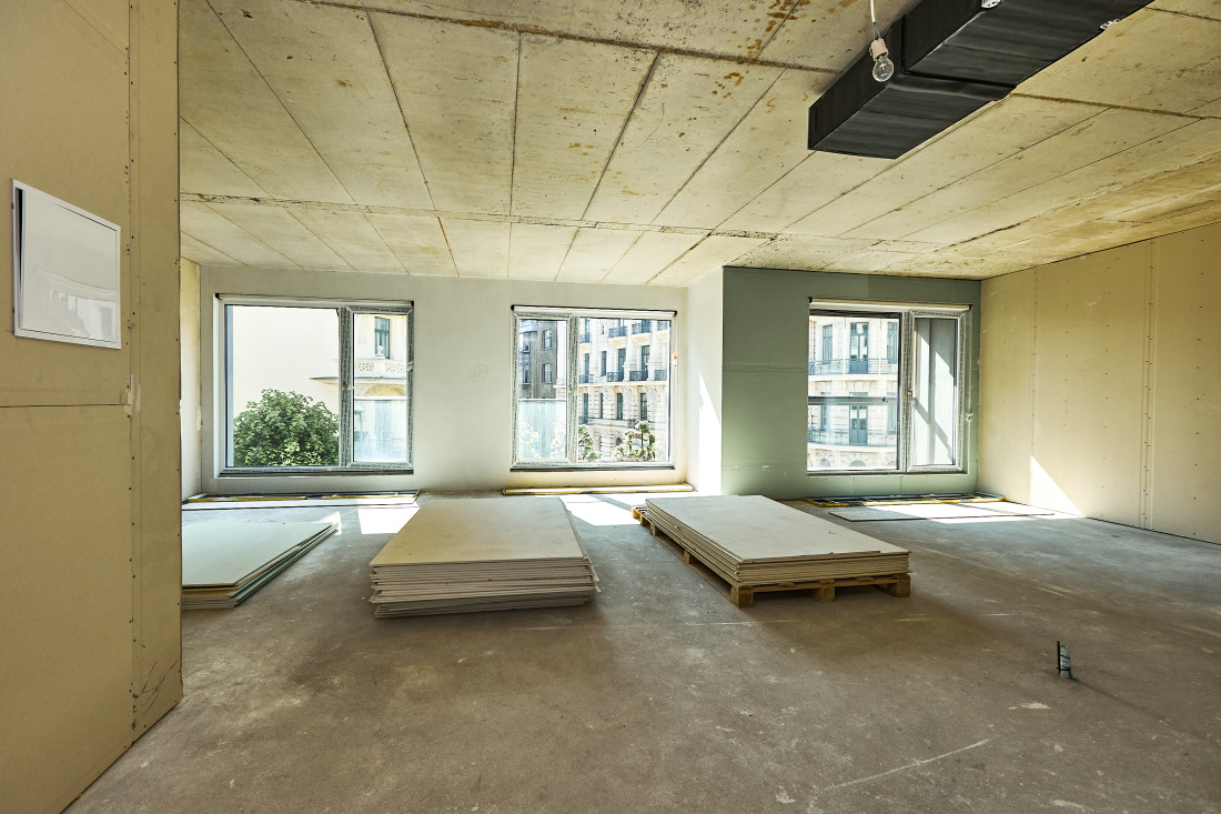 Under-construction spacious room layout.