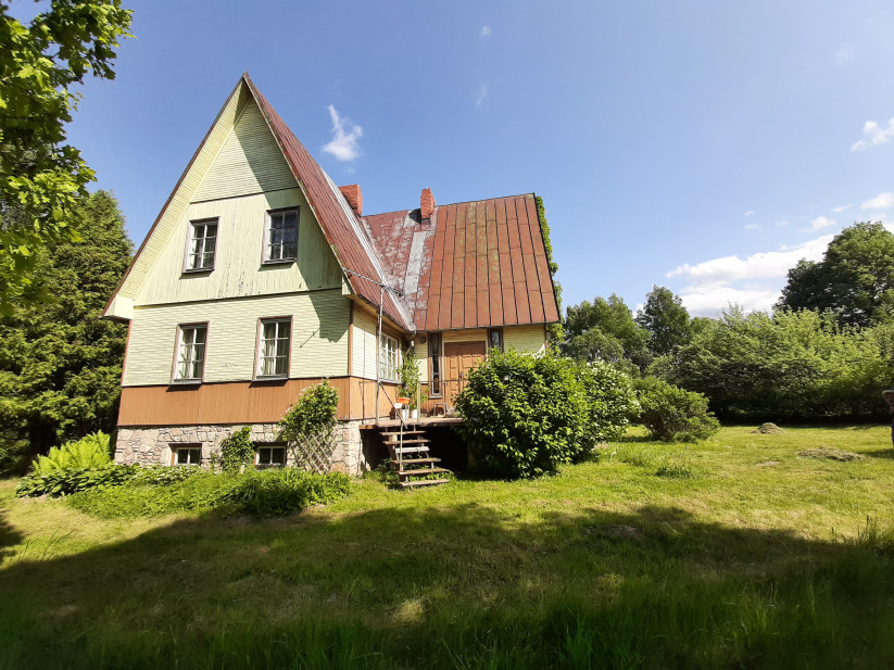 Residential house with a green garden.