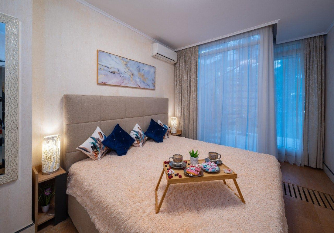Luxury bedroom with breakfast tray
