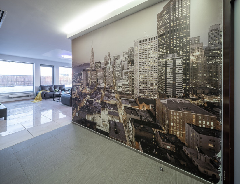 Wall decor with city skyline photo.