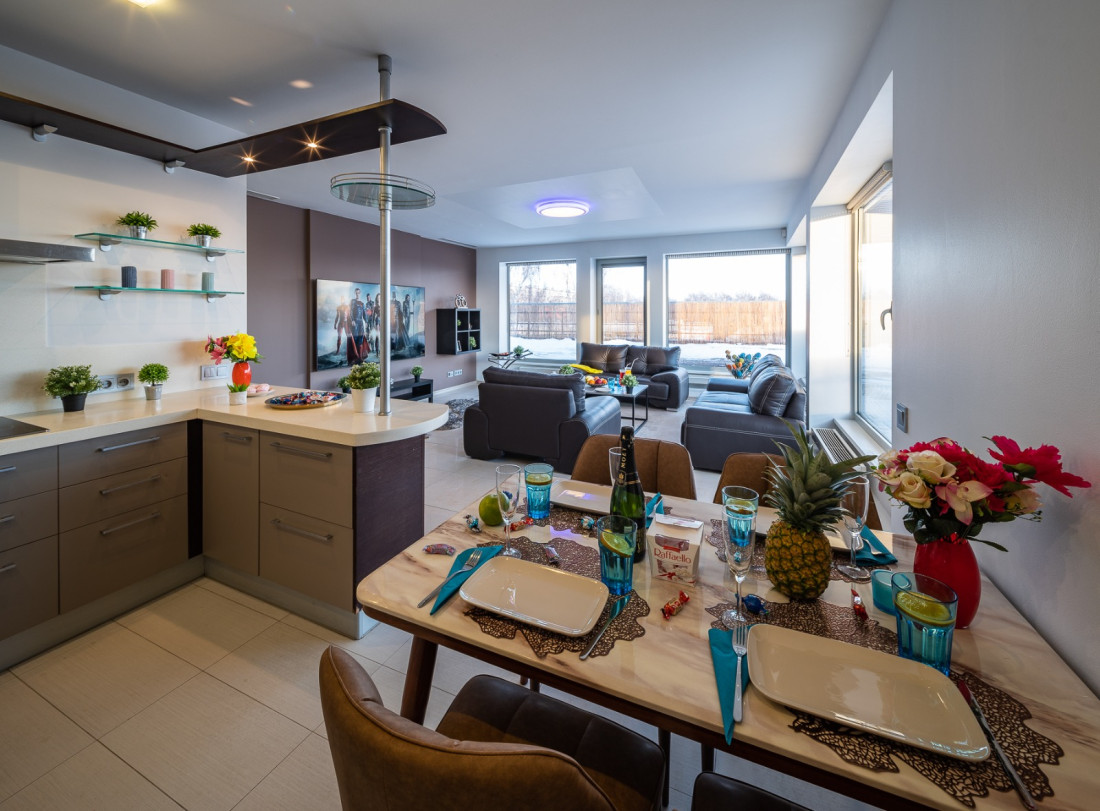Kitchen and dining area with modern decor.